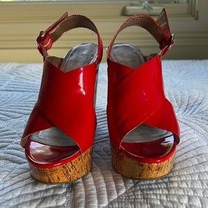 Red patent platform sandals